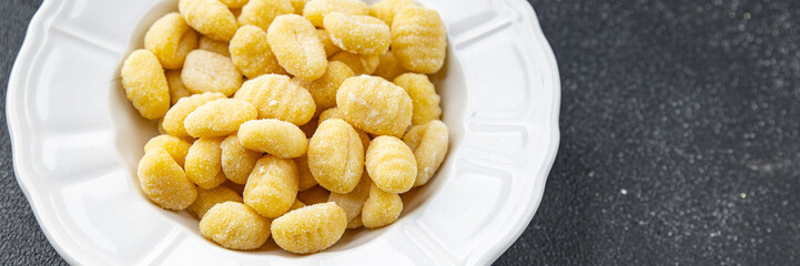 gnocchi raw potato food second course cooking appetizer meal food snack on the table copy space food background rustic top view keto or paleo diet