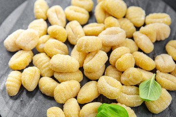 gnocchi raw potato food second course cooking appetizer meal food snack on the table copy space food background rustic top view keto or paleo diet