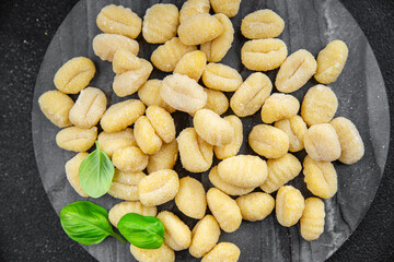 gnocchi raw potato food second course cooking appetizer meal food snack on the table copy space food background rustic top view keto or paleo diet