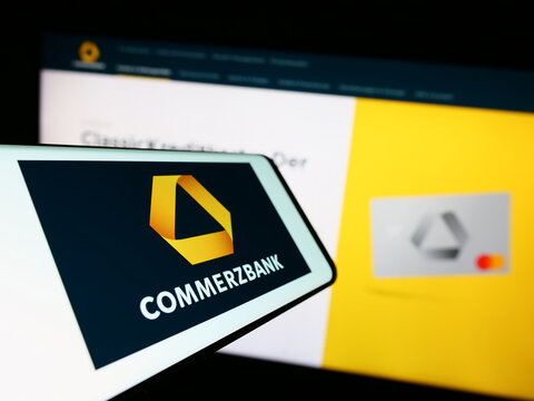 Stuttgart, Germany - 09-10-2023: Smartphone with logo of German financial company Commerzbank AG on screen in front of business website. Focus on center of phone display.