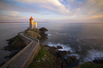 The last rays of the sun at the Petit Minou lighthouse in French Brittany