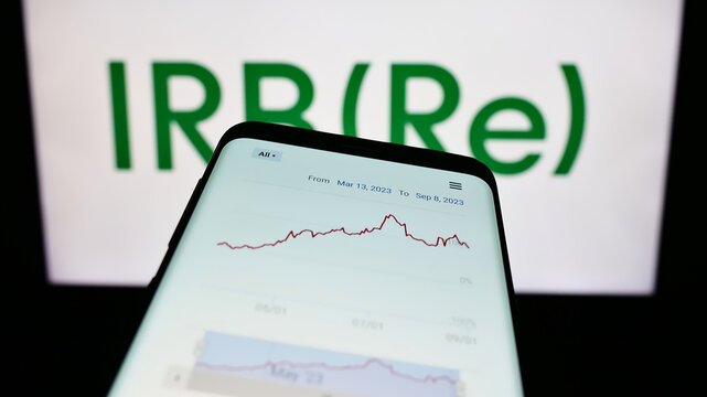 Stuttgart, Germany - 09-11-2023: Smartphone with website of Brazilian reinsurance company IRB Brasil RE on screen in front of business logo. Focus on top-left of phone display.