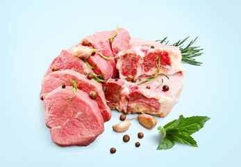 Raw red beef steak with herbs