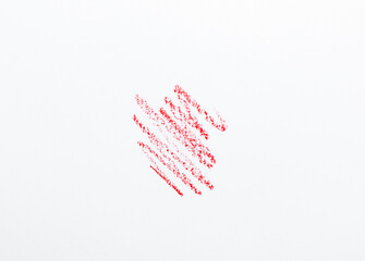 lines from red lip pencil on white paper close up make up artist content for social media