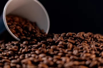 Fotobehang Koffiebar cup of coffee bean on brown cofee background.
