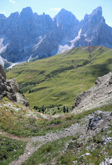 Fototapeta na wymiar impervious rock gully and the path to get to the valley in the European Alps