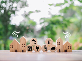 Miniature house with smart home icons. The concept of automation system technology for everythings...