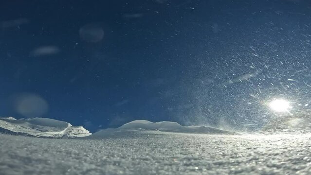 Drifting snow soft snow brought by Wind Transport for skiing, extreme winter sports Ski resort with fresh snow covered in windy weather as drifting snow maps out new slopes for skiing and snowboarding