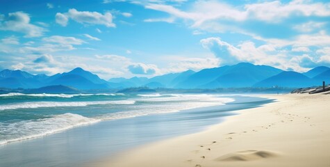 stunning coastal view of sand dunes with majestic mountains in the rear