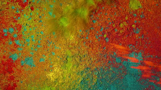 Colorful Powder Splats Making Vibrant Mixture Of Colors