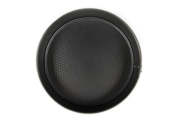 Top view of a new black collapsible round stainless steel cake pan isolated on white background.