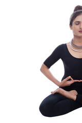 Young Indian female practising Yoga and fitness exercise