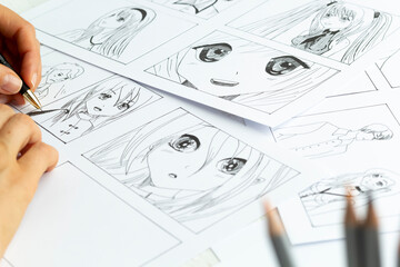 An artist draws a storyboard of an anime comics book. Manga style.	