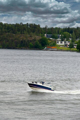 Fototapeta premium Swedish speed boat in Stockholm Archipelago on the Baltic Sea - Sweden
