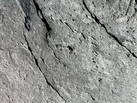 texture of volcanic rock from eruption with small hole