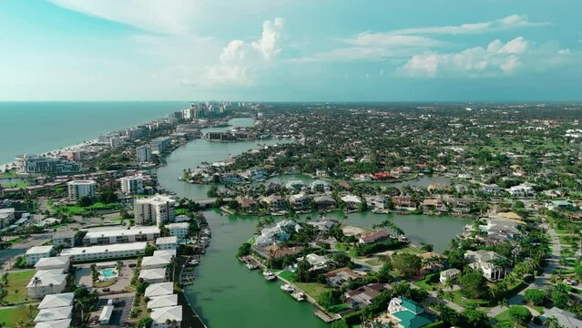 Aerial wide footage. Homes in Naples. Florida neighborhoods. real estate footage