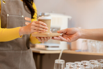 Small business owner, successful businesswoman, beautiful woman standing in coffee shop Portrait of a tanned Asian woman, barista, cafe, business concept owner, seller, SME