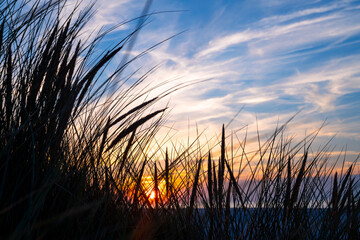 Colorful sunset on the east frisian coast of Germany, on Juist island. Popular holiday destination...