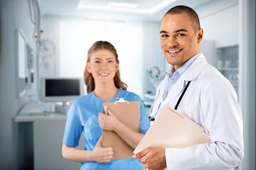 Obraz premium Team of happy doctors analyzing diagnosis in hospital, AI generated image