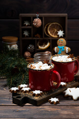 cozy winter drink hot chocolate on a wooden table, vertical