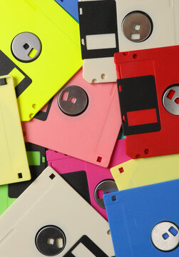 Background of many colored retro floppy disks