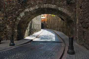 Archway over cobblestone streets; Guanajuato mexico