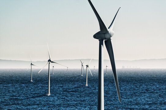 Digital composite of wind turbines on the water; Tarifa cadiz andalusia spain