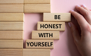 Be honest with Yourself symbol. Wooden blocks with words Be honest with Yourself. Businessman hand. Beautiful pink background. Be honest with Yourself concept. Copy space. - obrazy, fototapety, plakaty