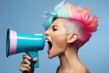 Deurstickers Young woman with a short haircut of rainbow color shouts into a blue pink megaphone on a white background © Маргарита Вайс