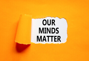 Our minds matter ourmindsmatter symbol. Concept words Our minds matter on beautiful white paper. Beautiful orange background. Our minds matter ourmindsmatter concept. Copy space.
