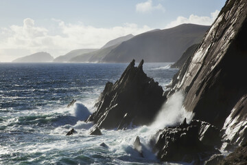 Waves Crashing Against The Rugged Coastline Of The Blasket Islands, Dingle Peninsula; County Kerry, Ireland