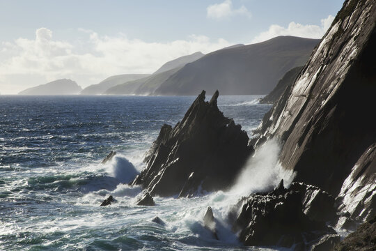 Waves Crashing Against The Rugged Coastline Of The Blasket Islands, Dingle Peninsula; County Kerry, Ireland