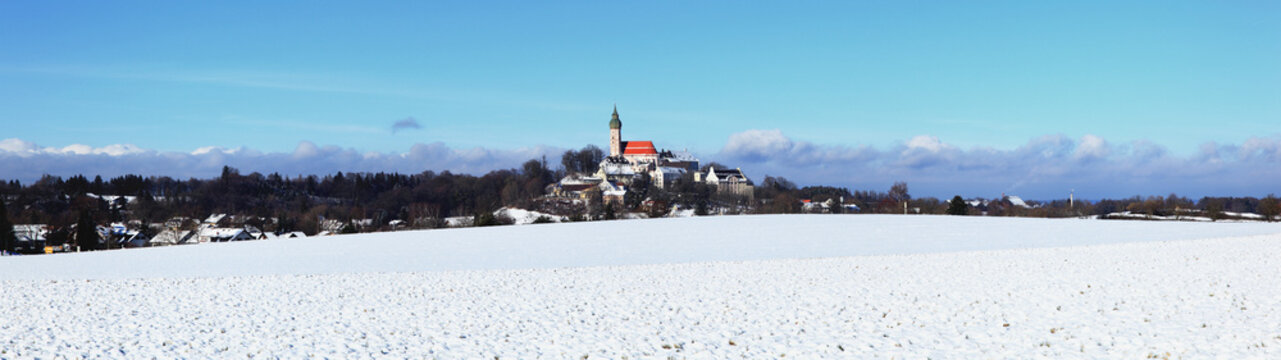 Panaroma Of A Snowy Field And Andechs Abbey In The Distance; Herrsching, Bavaria, Germany