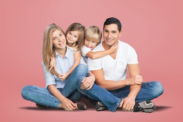 Happy young parents with child posing