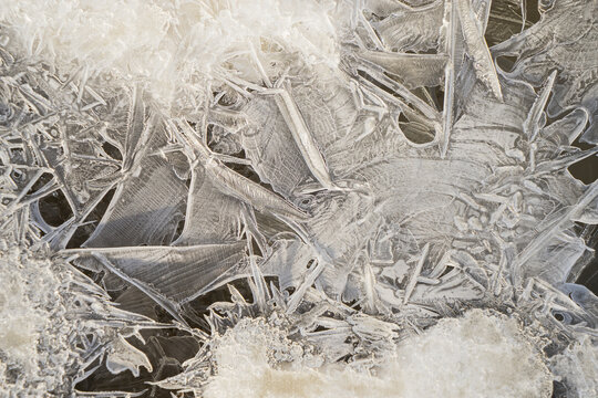 Brittle Ice Forming Along The Banks Of The Porcupine River During A Cool Spring Morning; Old Crow, Yukon, Canada