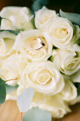 Obraz na płótnie Canvas Bridal bouquet. Wedding. Wedding day. Love. Rings. Wedding rings. Engagement. Flowers. Beautiful bouquet. The bride's bouquet. Bride. Aesthetics. Details.