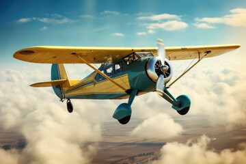 A compact yellow and blue airplane soaring through the sky. Ideal for aviation enthusiasts and travel-related designs. - obrazy, fototapety, plakaty
