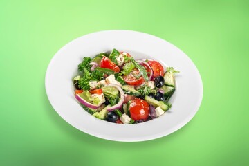plate of fresh tasty healthy salad with vegetables