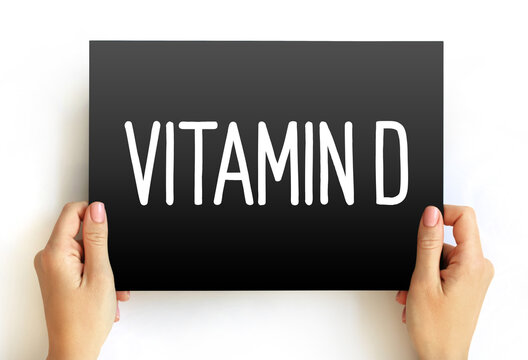 Vitamin D - group of fat-soluble secosteroids responsible for increasing intestinal absorption of calcium, magnesium, and phosphate, and many other biological effects, text concept on card