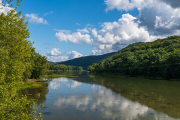 Fototapeta na wymiar A view of the Allegheny River in Tidioute, Pennsylvania, USA on a sunny summer day