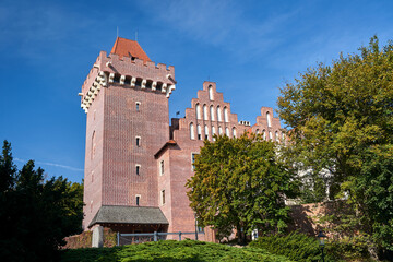 tower red brick  reconstructed historic royal castle   in Poznan - obrazy, fototapety, plakaty