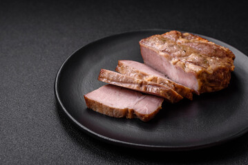 Delicious juicy pork or beef steak cooked on the grill with salt and spices