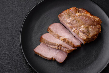 Delicious juicy pork or beef steak cooked on the grill with salt and spices