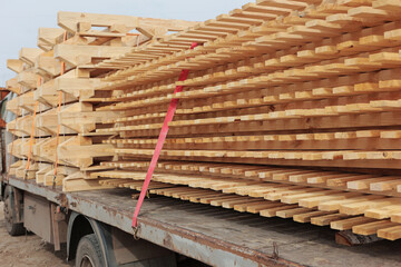 Stack of wooden pallet. Industrial wood pallet at factory warehouse. Cargo and shipping concept....