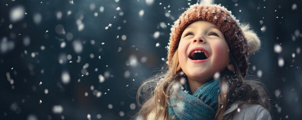 Magic of a child's wonder as they catch snowflakes on their tongue during the first snowfall of the season