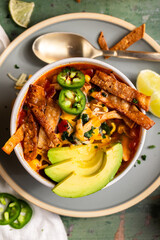 Tortilla Soup with Avocado, Jalapeños, Tortilla Strips and Lime