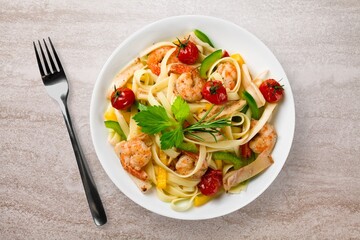 Tasty fresh pasta noodles dish with sauce