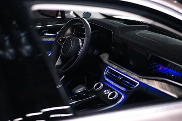 Car interior wood and leather decoration and blue ambient light