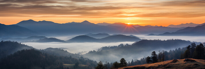panorama, sun rising over a mountain range, valleys filled with mist, vibrant sky transitioning from indigo to orange