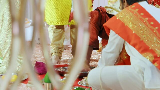 Indian Hindu couple giving their Rituals is being performed during wedding ceremony. Close up elements ceremony